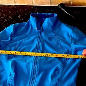 Blue Zip-Up Jacket lululemon . Not sure of size small or medium.